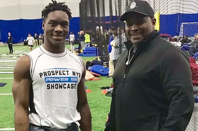 Coach Rick with Nathan Carter at a national combine, before Carter played at UConn, Michigan State, and signed with the Atlanta Falcons