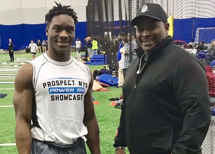 Coach Rick with Nathan Carter at a national combine, before Carter played at UConn, Michigan State, and signed with the Atlanta Falcons