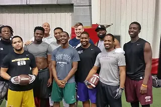 Next Level and Beyond alumni training together in college gear