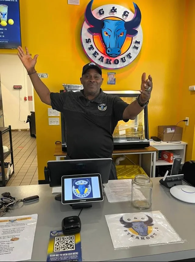 Coach Rick behind the counter at G and G Steakout II, the restaurant he ran in Rochester, New York