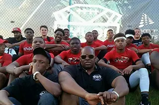 A Next Level and Beyond team seated together at a national prospect event